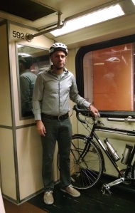Holding my bike while riding the Red Line Subway into Hollywood. 